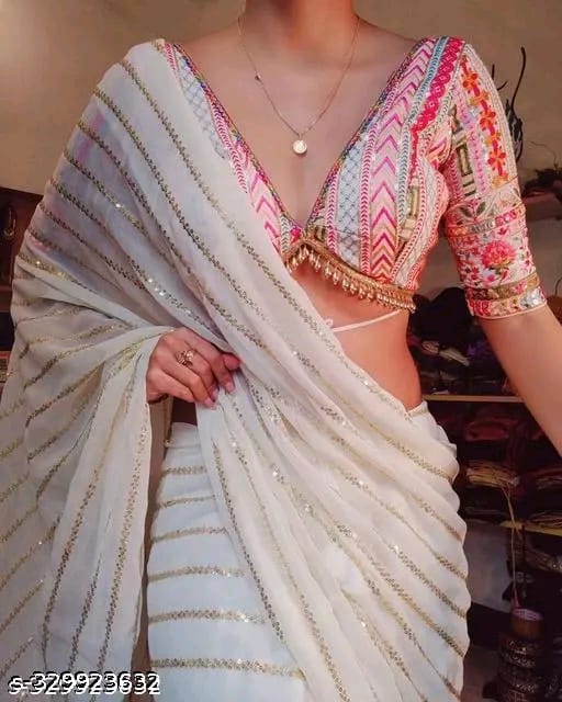 SM Women Georgette Embellished Saree with Embroidered Blouse